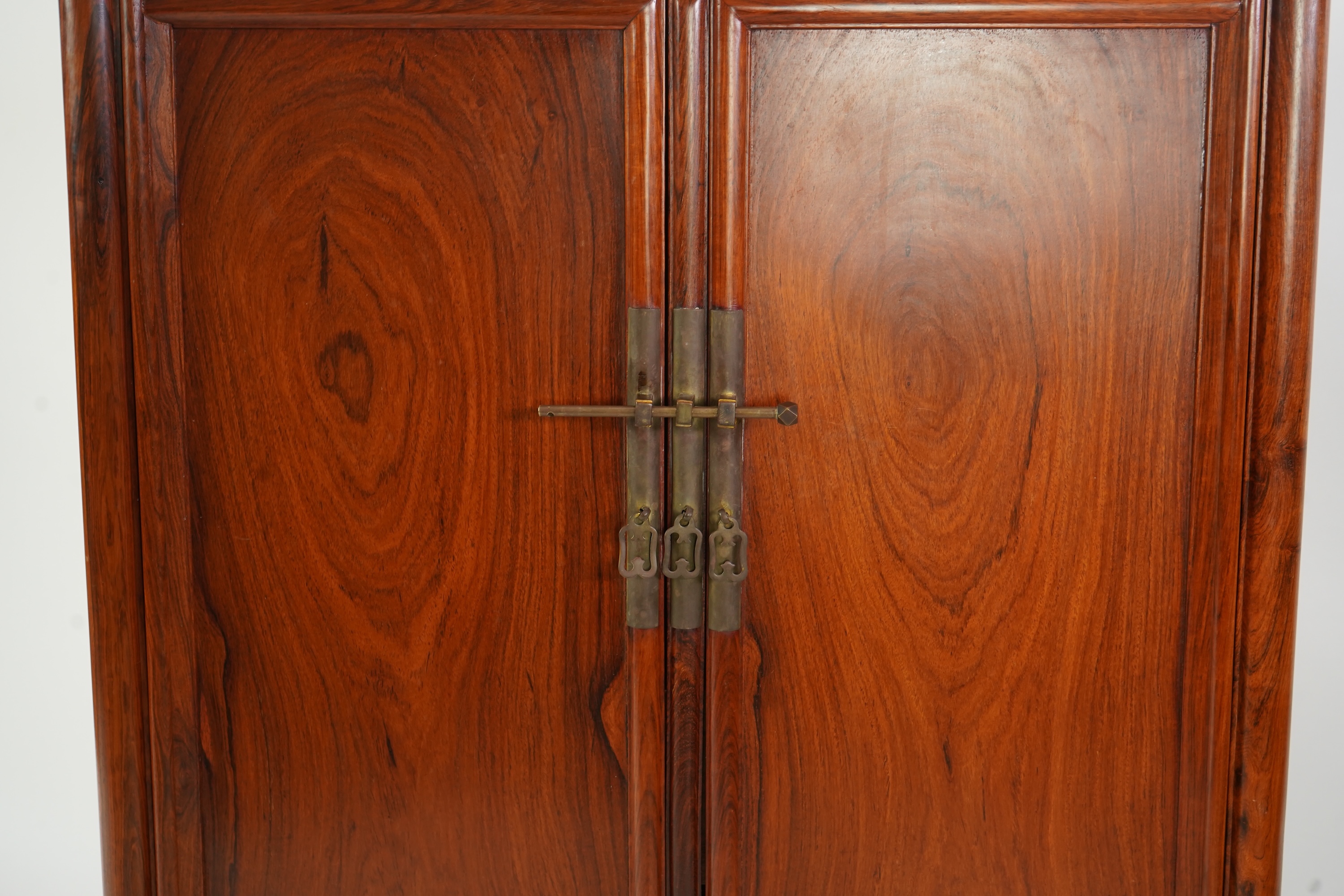 A Chinese huanghuali round-corner cabinet, yuanjiaogui, 19th/20th century